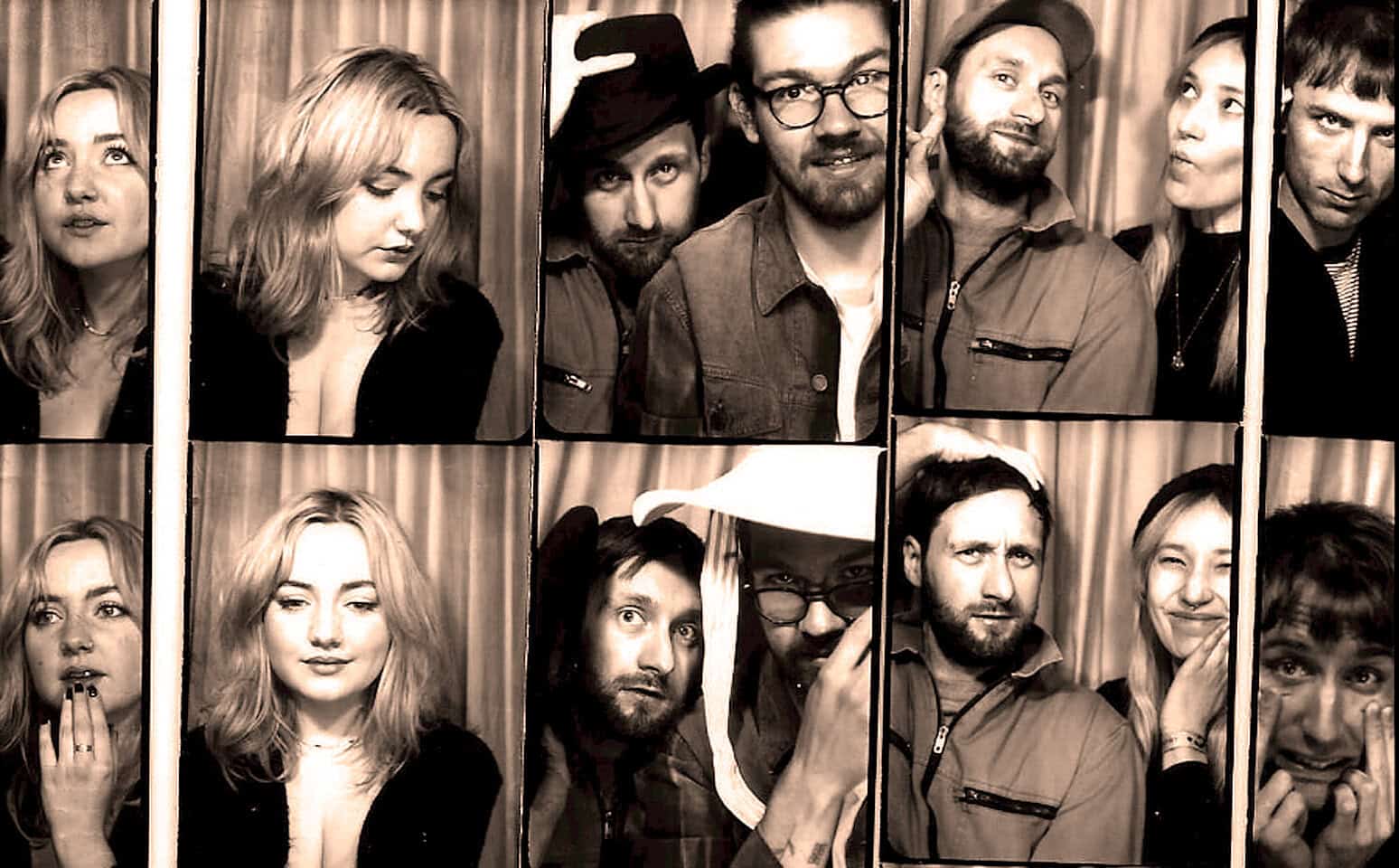 An eclectic group of people posing in a photo booth, capturing fun and candid moments, suitable for vintage music and news archive themes on Past Daily.