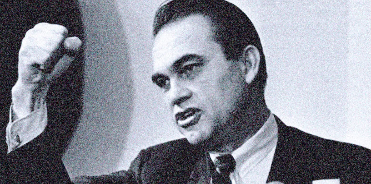 Historical news archive with image of a man speaking, vintage news recording, music and history preservation, Past Daily sound archive, radio broadcasting history and news commentary.