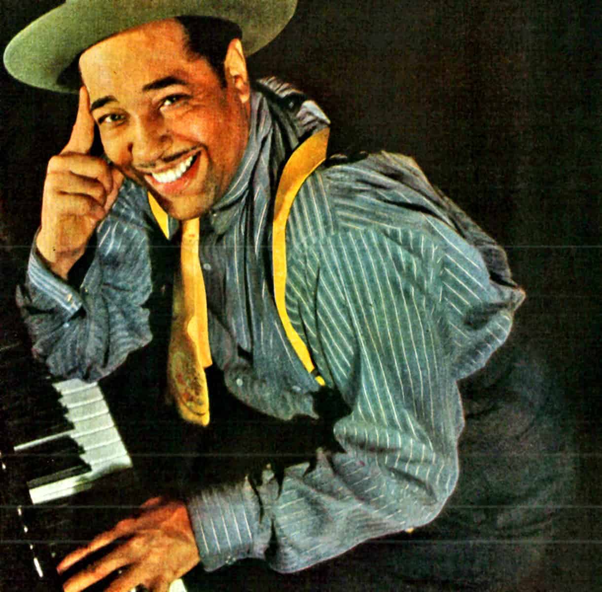 Vintage jazz musician smiling at the piano, wearing a fedora and striped shirt, representing nostalgic music history and classic sound archives.
