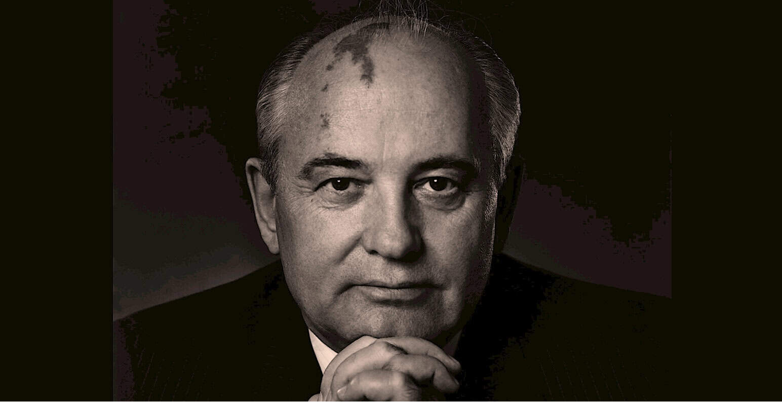 Portrait of a distinguished man, black-and-white photo emphasizing historical news and radio archive themes, capturing the essence of past news, history, and music preservation.