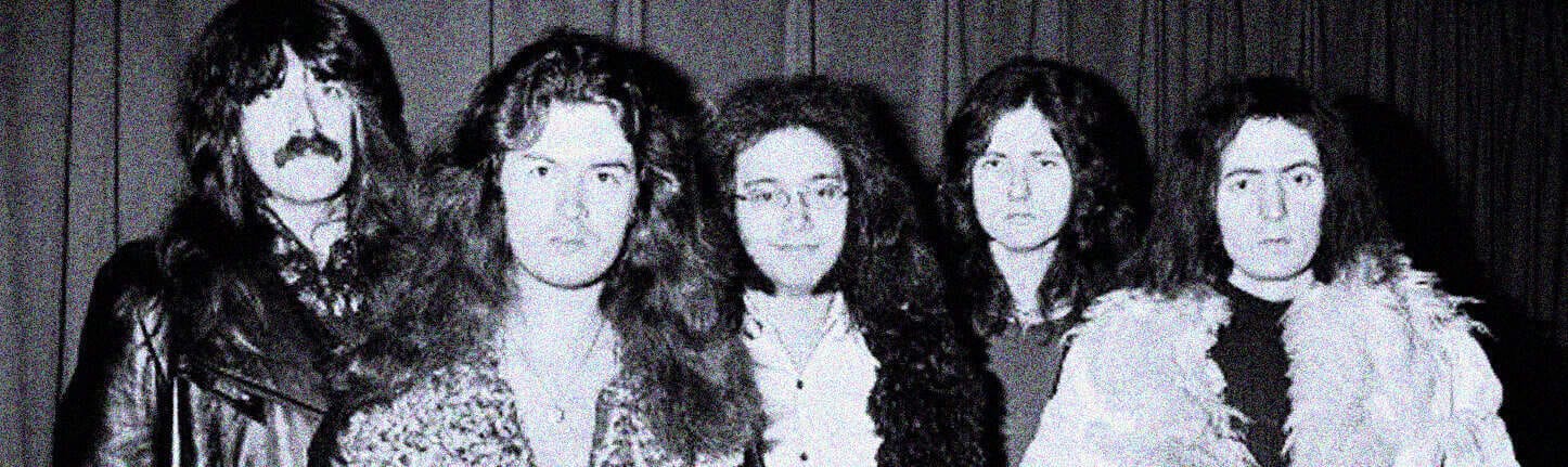 Vintage rock band photo featuring women musicians, reflecting music history and iconic sound archives, ideal for nostalgic music lovers and history enthusiasts.