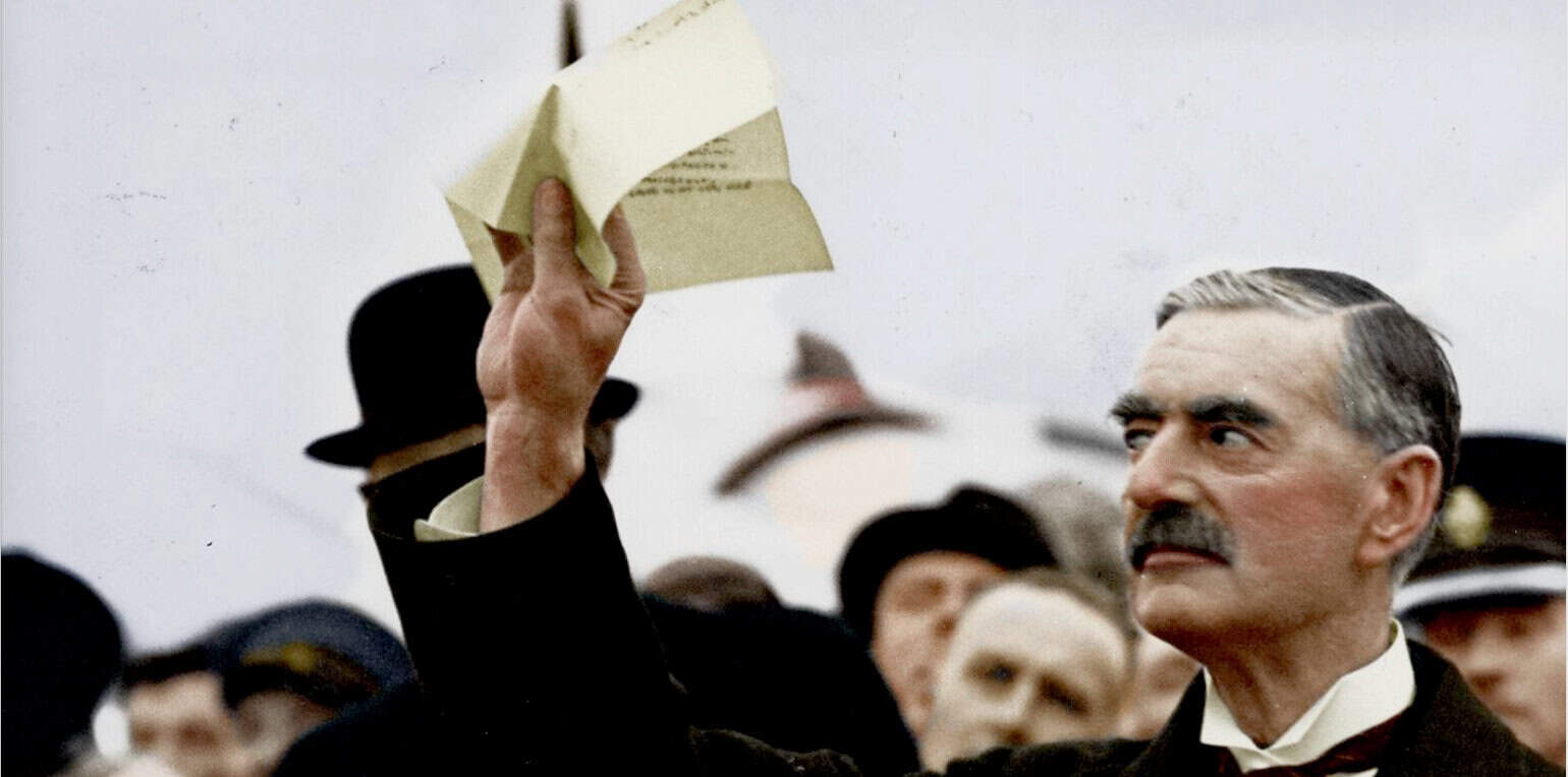 Blue suit man holding book in crowd, historical event, news archival photography, classical music and history documentation, vintage photo of public demonstration, media and news archive image, Past Daily history collection.