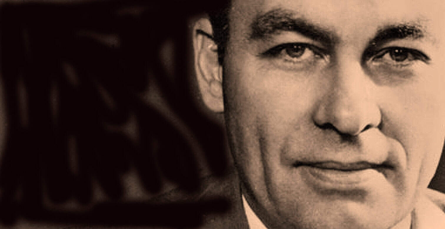 Historical black and white portrait of a man, focusing on face, vintage style, documentary photography, iconic image, Radio, news archive, history, music, past daily archive, sound recording, audio history, media archive.