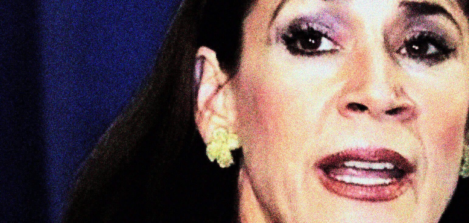 Close-up of a woman with vintage glamorous makeup and floral earrings, capturing a nostalgic vibe for news, history, and music archive websites.
