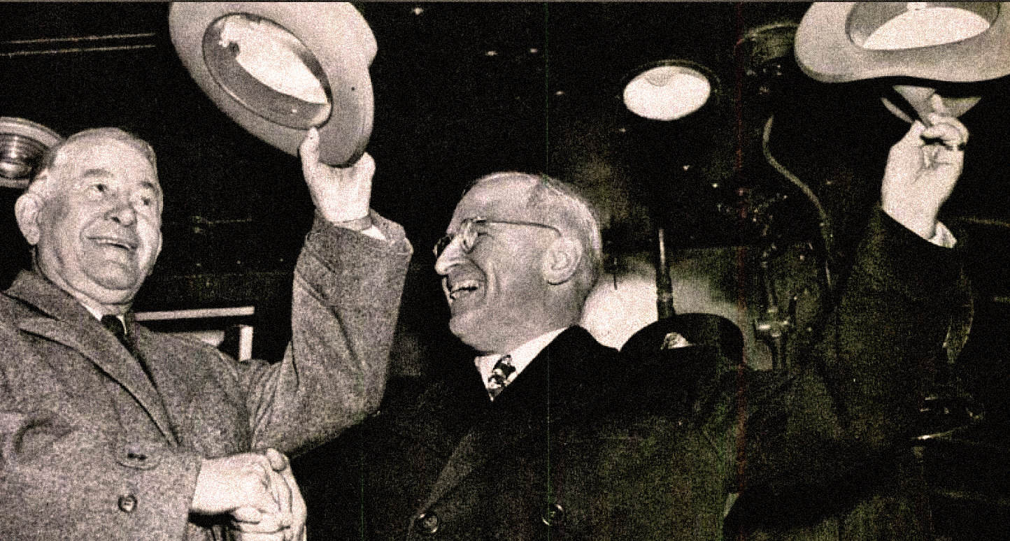 Handshake between two smiling men at a vintage event, historic music and news archive, black and white photo.
