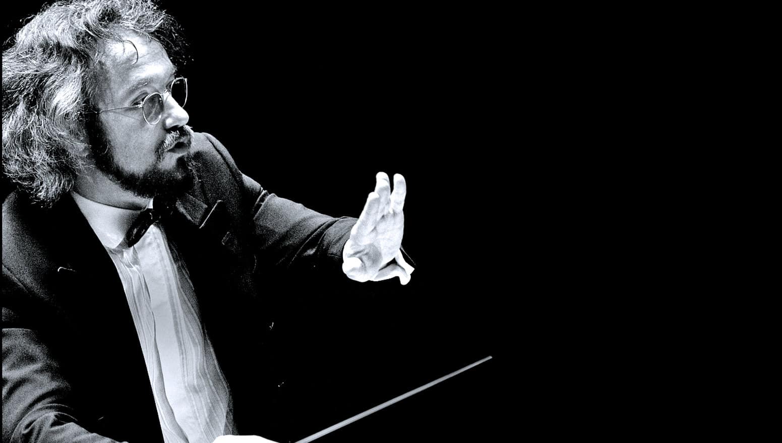 Silent film of a pianist playing jazz music, black and white image emphasizing classic entertainment visuals for nostalgic music and historical sound archive themes.