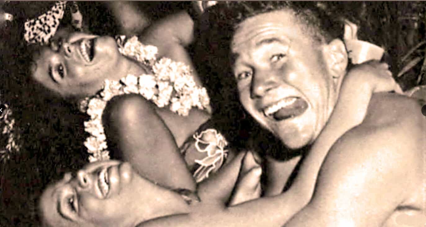 Band of indigenous people celebrating with joyful expressions, traditional attire, and necklaces, capturing cultural history and heritage for archival purposes.