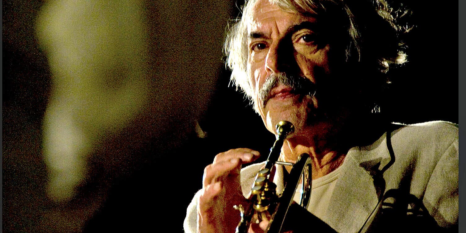 Vintage musician playing the saxophone in a black and white concert scene, capturing the essence of music history and archival news footage, ideal for historical and musical archive images.