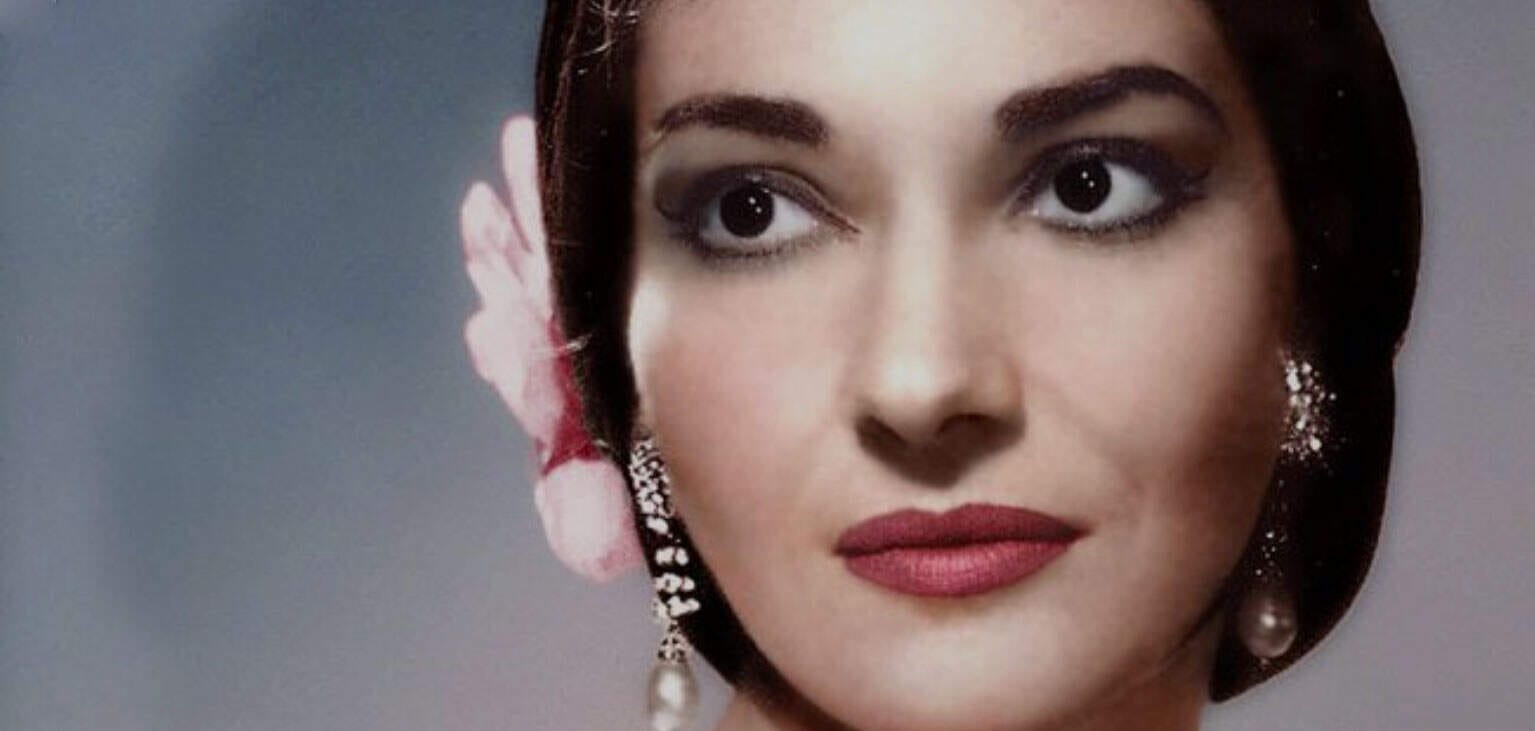 Elegant woman with vintage hairstyle and glamorous jewelry, fashion, beauty, retro glamour, classic style, red lipstick, pearl earrings, Hollywood inspired.