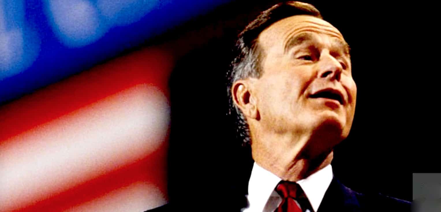 Patriotic American political speaker with an American flag background, emphasizing history and news archive themes.