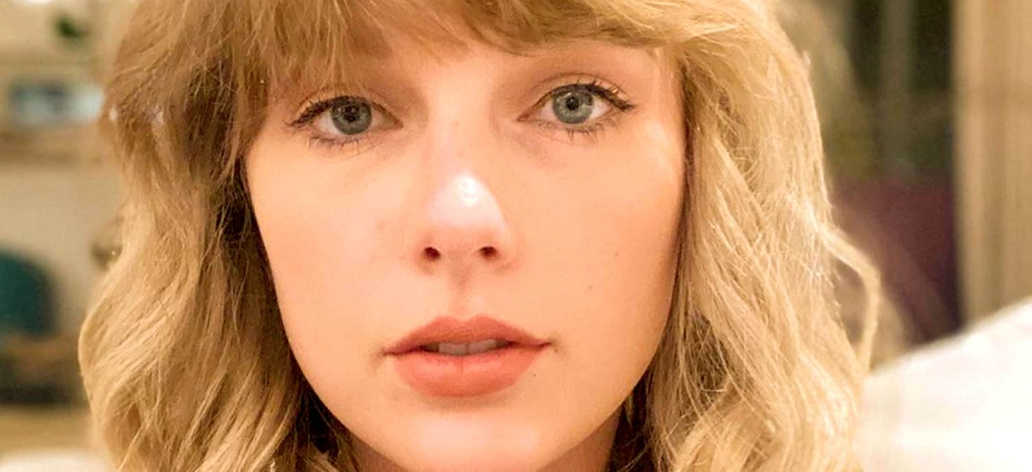 Close-up of a young woman with blonde wavy hair and blue eyes, showcasing natural beauty, perfect for themes of music, history, and news archives on Past Daily.