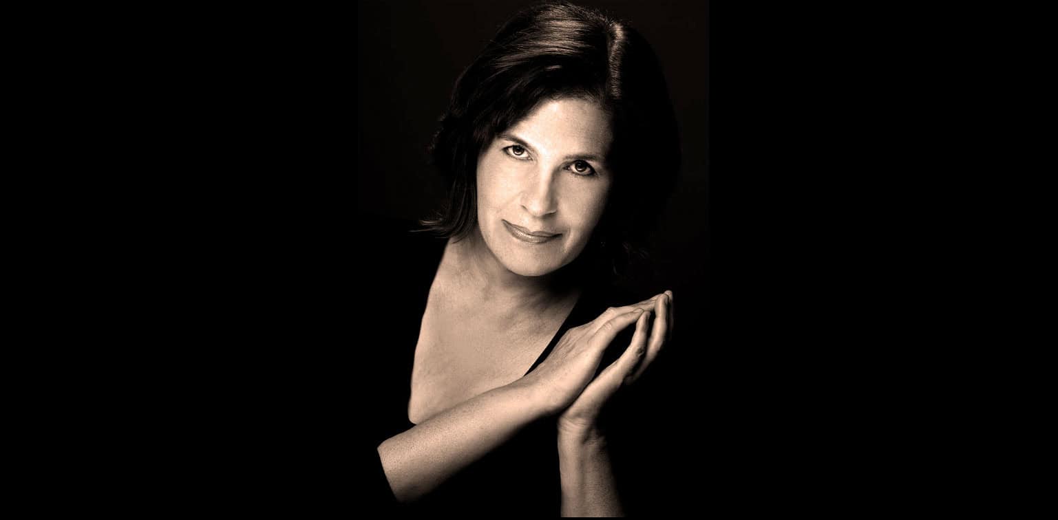 Elegant female portrait, black hair, classic music and news archive theme, showcasing timeless entertainment and history, perfect for Past Daily sound archive visuals.