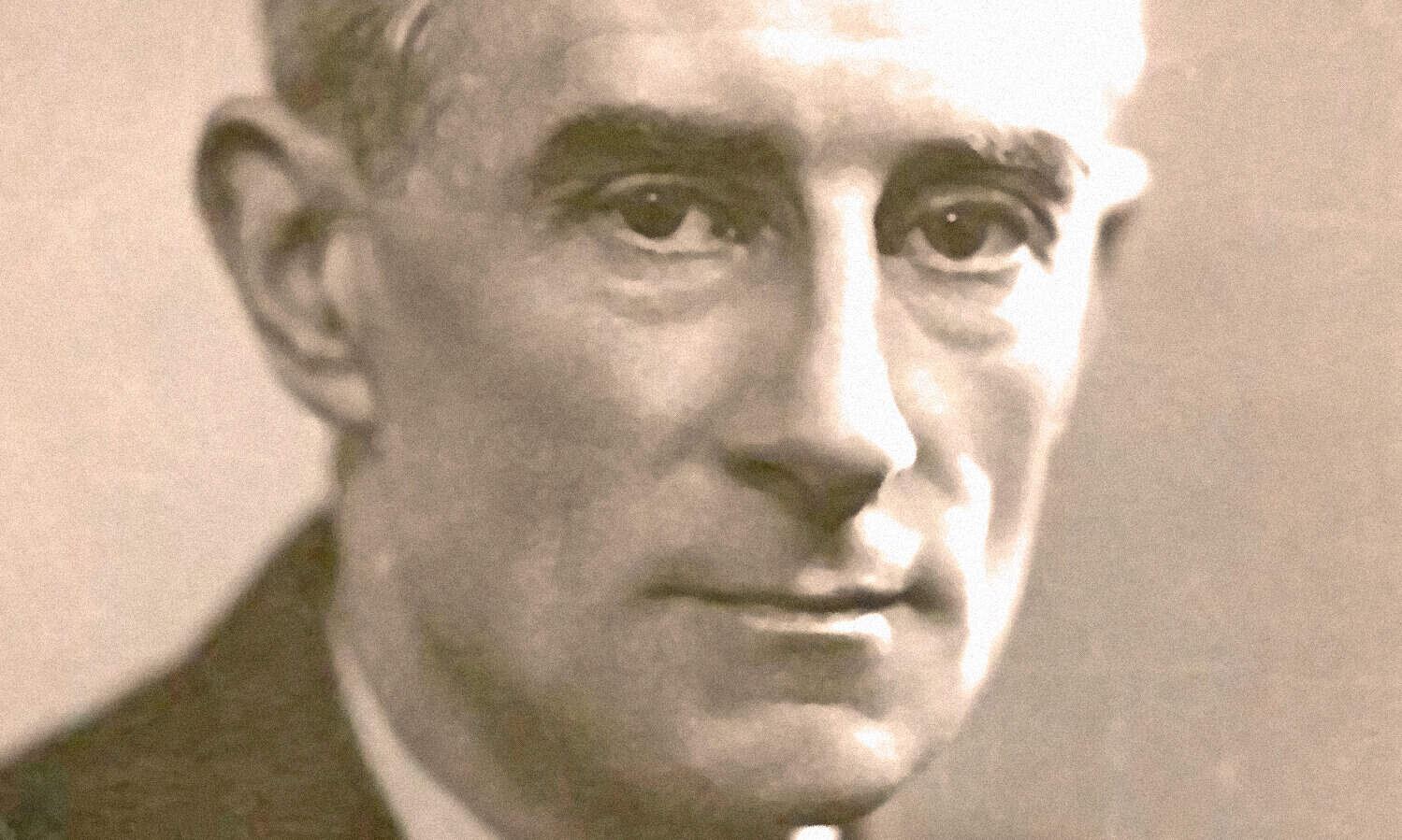 Historical black-and-white portrait of a distinguished man with glasses, highlighting a classic figure in American history and culture.