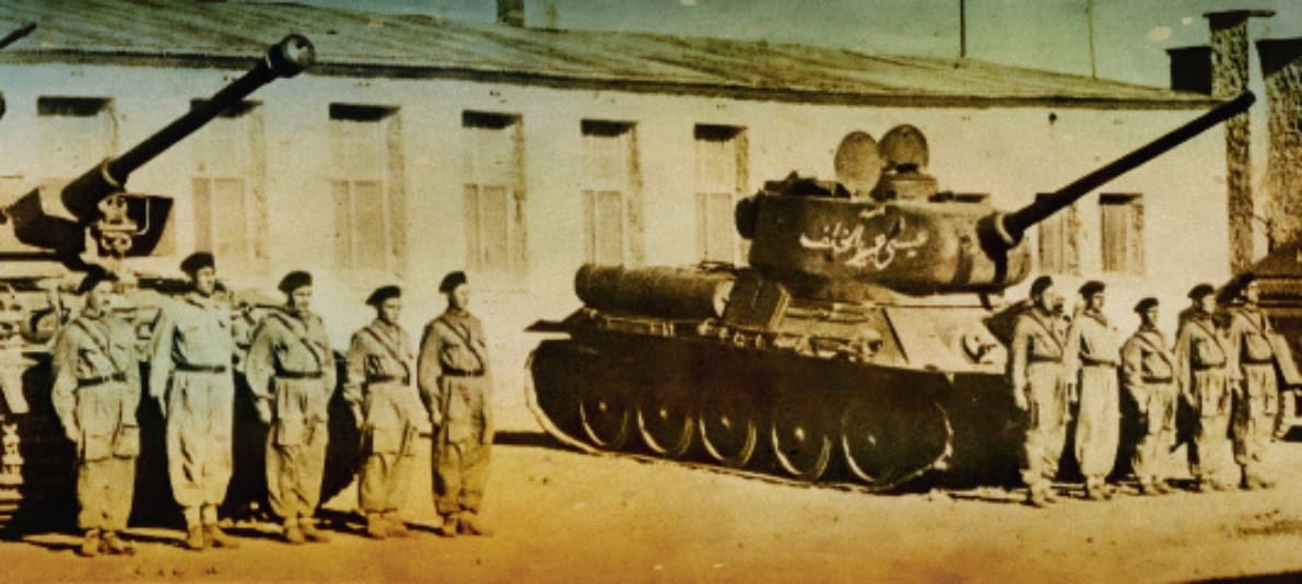 Tanks and soldiers in a historical military scene, representing news coverage and archival footage of wartime history featured on Past Daily.