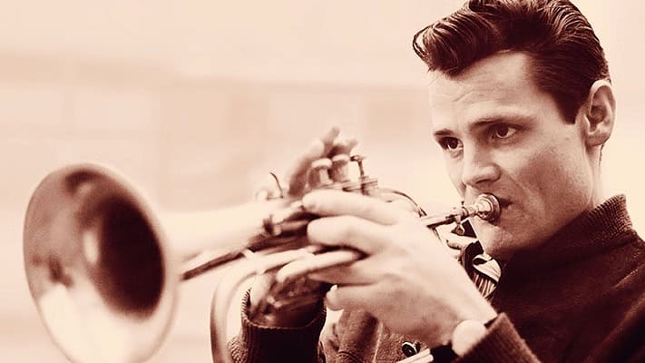 Vintage jazz musician playing the trumpet, emphasizing historical music archives, news, and cultural memorabilia.