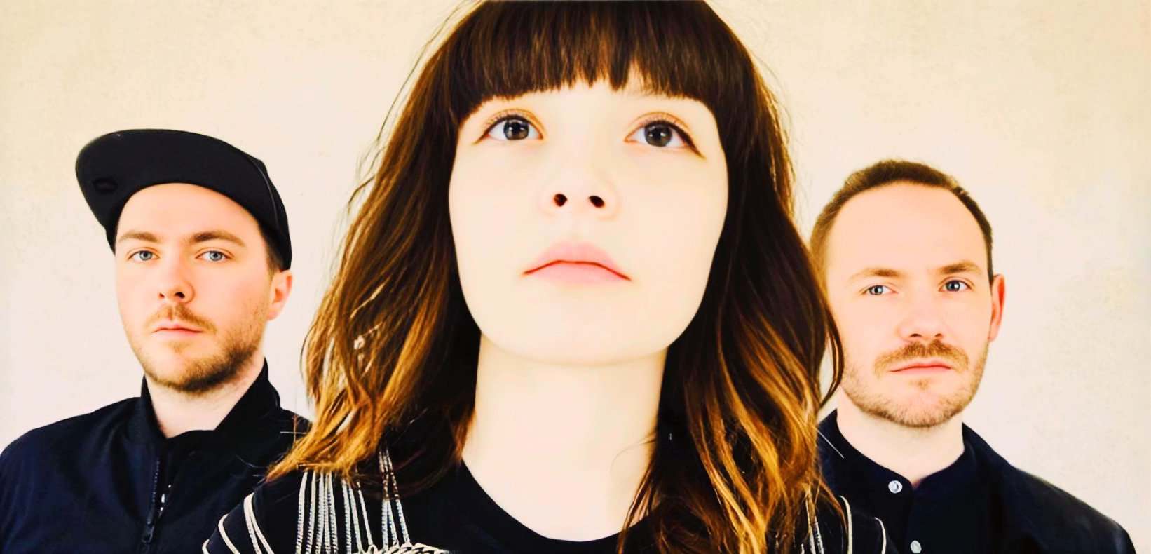 Vintage band photo featuring young musicians promoting music, news, and history archives, emphasizing timeless sound recordings and classic performances.