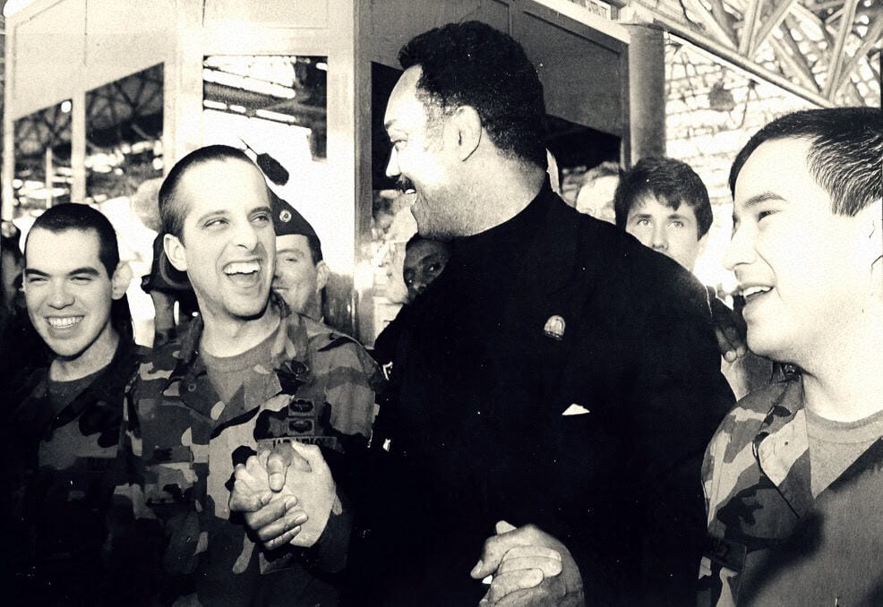 NY0JMKFJGH-001.jpg, Military personnel and a government official greeting each other, historic moment captured in black and white image, representing news coverage of political and military events, part of sound archive of news and history.